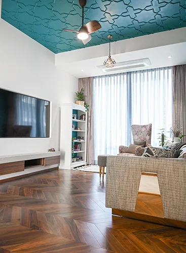 A stunning hall ceiling design featuring intricate coffered panels with ornate molding.