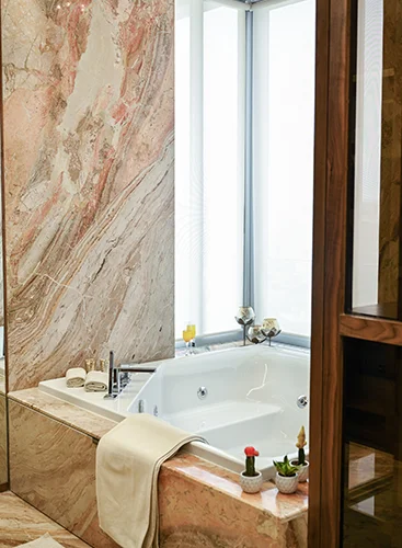 7 Nirvana created an elegant restaurant washroom with modern fixtures and a tasteful color scheme.