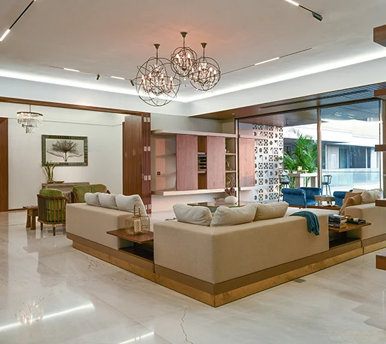 An elegant drawing room interior at 7 Nirvana featuring a harmonious blend of soft, earthy tones