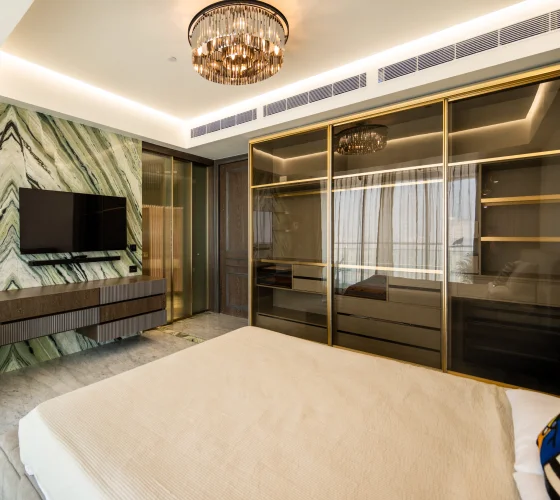 home interior design featuring a sleek bedroom with modern furniture and elegant decor.