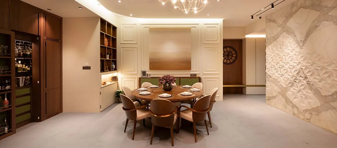 Luxury Interior Designer - stylish room featuring a wine cabinet and a refrigerator, showcasing an elegant and functional design for beverage storage.